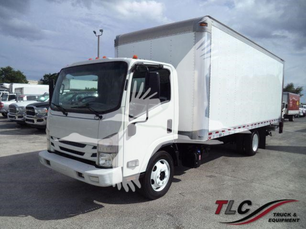 Isuzu NPR box truck in-view showing cab and cargo box with stock number 210706FM visible.