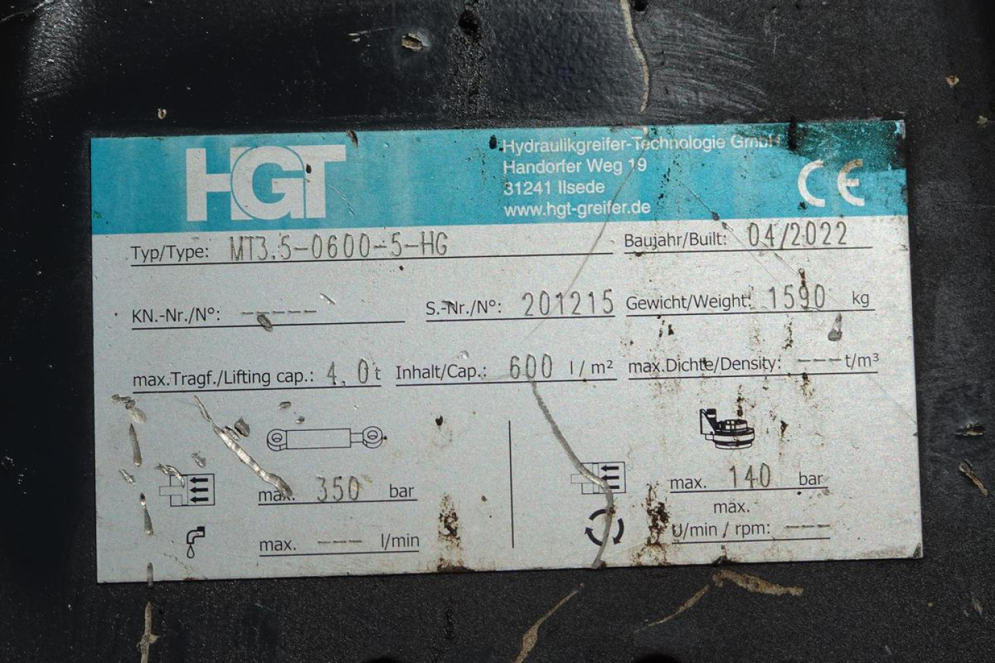 Label on Terex equipment showing HGT logo, model MB-5-0600-5-HG, serial and weight data, plus hydraulic specs and max capacities.