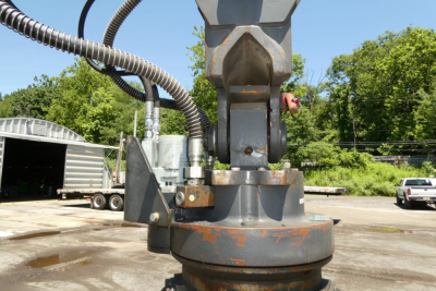 Terex MHL350D boom swing base mounting and hydraulic hose showing industrial heavy equipment component.