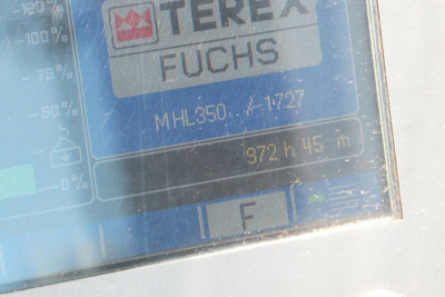 Terex MHL350D equipment display panel showing model MHL350 and branding Terex Fuchs with hours 972 h and approx 45 ft reach.