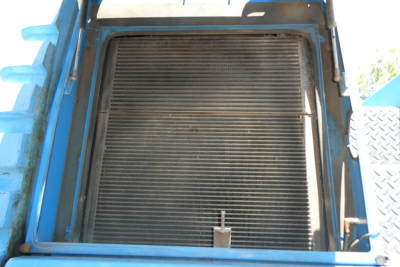 Terex MHL350D equipment interior showing radiator/grill assembly and surrounding blue frame.