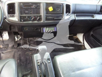 Interior of a 2019 Hino 268a cab showing center instrument panel, steering column, gear selector, and dashboard controls.