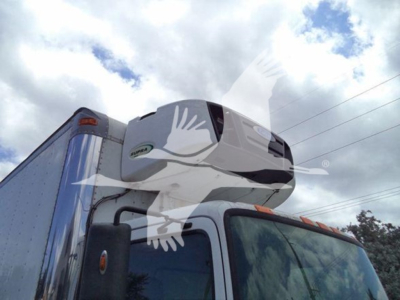 Hino 268a refrigerated truck cab with trailer unit on top, side view, no visible text.