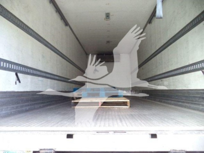 Truck trailer interior showing a wooden pallet on the floor with side rails and an overhead liner for a 2019 Hino 268A refrigerated truck.