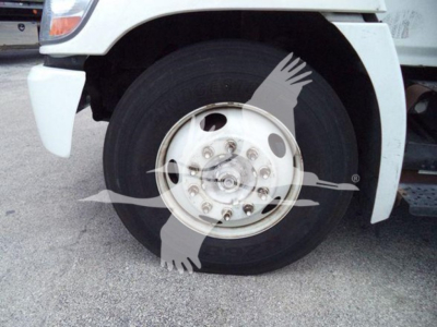 Wheel and tire of a refrigerated 2019 Hino 268a truck with stock number 26199R and VIN 5PVNJ8JV0K4S73415.