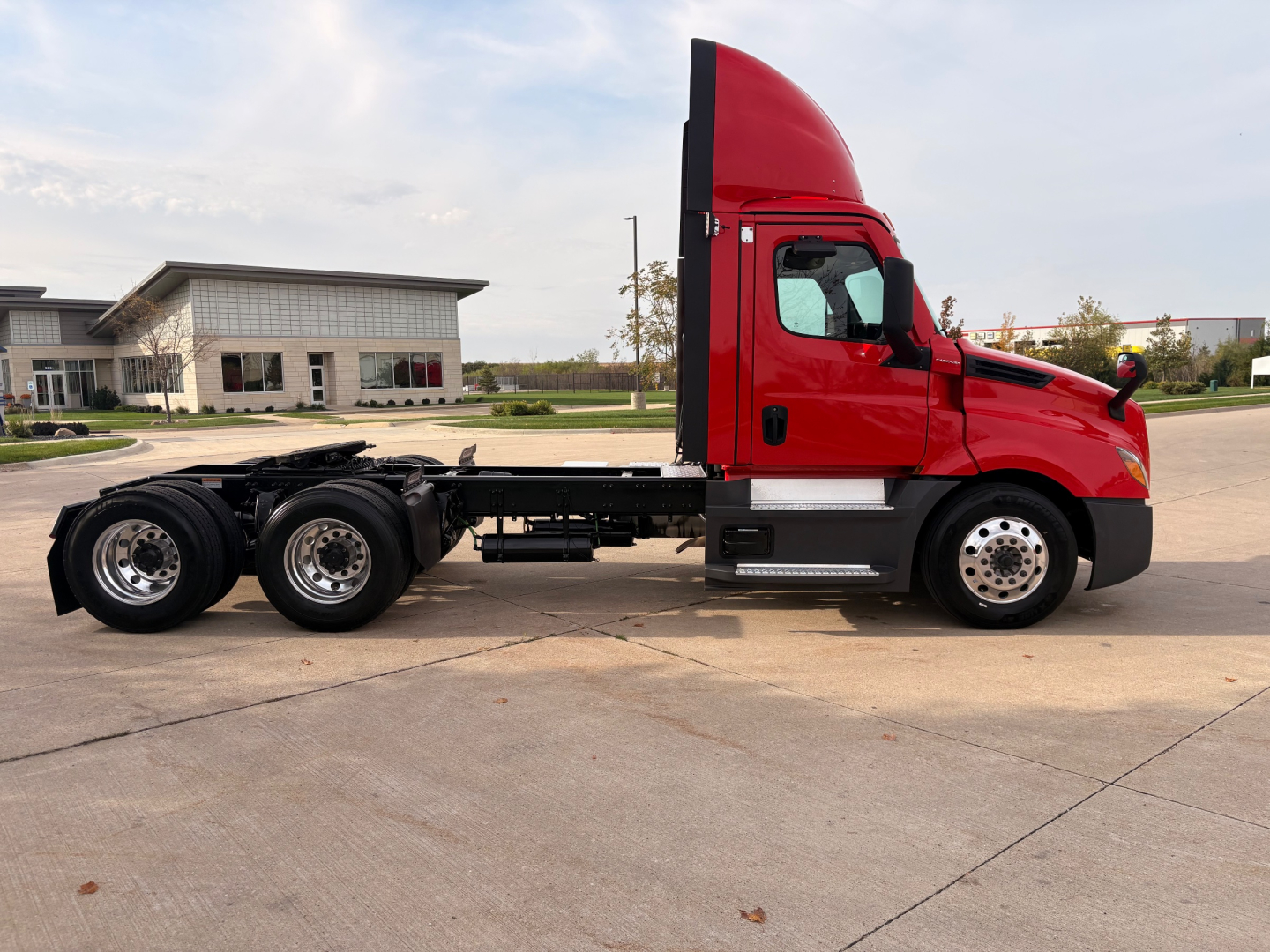 Freightliner PT126064S T truck chassis side profile showing cab and rear axles.