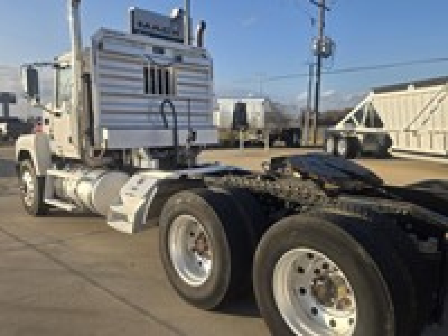 2019 Mack PI64T truck tractor chassis and cab shown in side view with dual rear wheels and fifth wheel area visible.