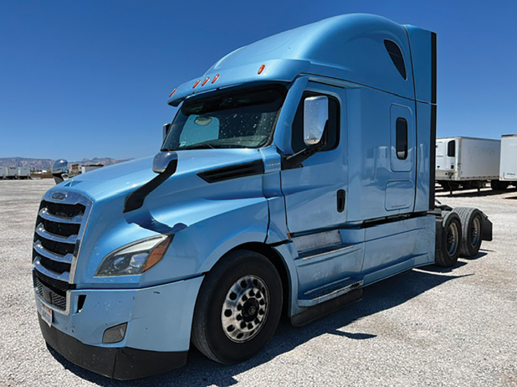 Freightliner Cascadia126 semi-truck in a light blue color, side view showing sleeper cab and front grille.