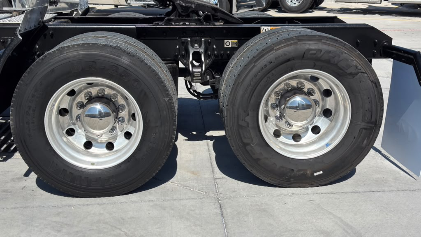 Kenworth T680 chassis with dual rear wheels showing clean steel rims and tires