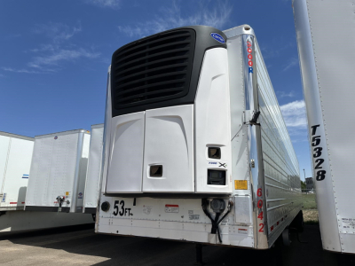 Utility Reefer trailer in bay view showing Thermo King unit and front doors with '53 FT' label.