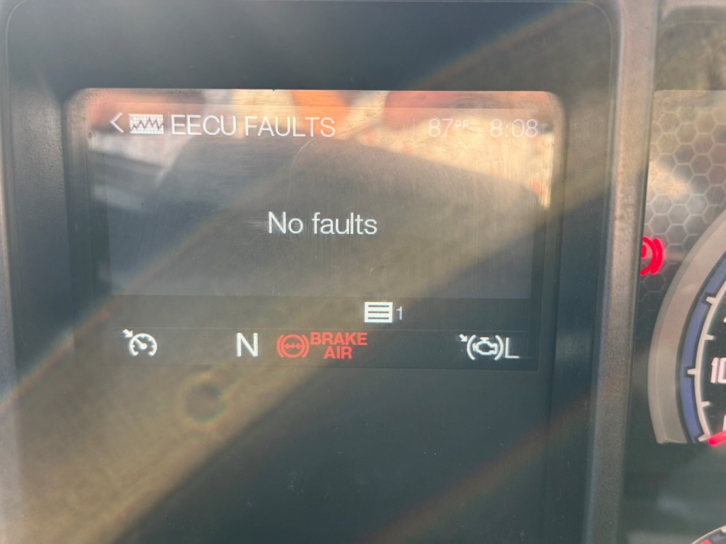Dash display showing 'No faults' on Mack PI64T cab; dashboard with N, brake air, and warning icons visible.