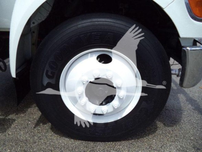 Wheel and tire of a Ford F650 truck showing Goodyear tire with rim and hub area.