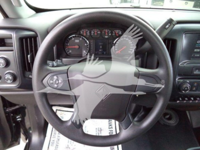 Interior view of a 2023 International CV truck cab showing steering wheel, instrument cluster, and dashboard controls.