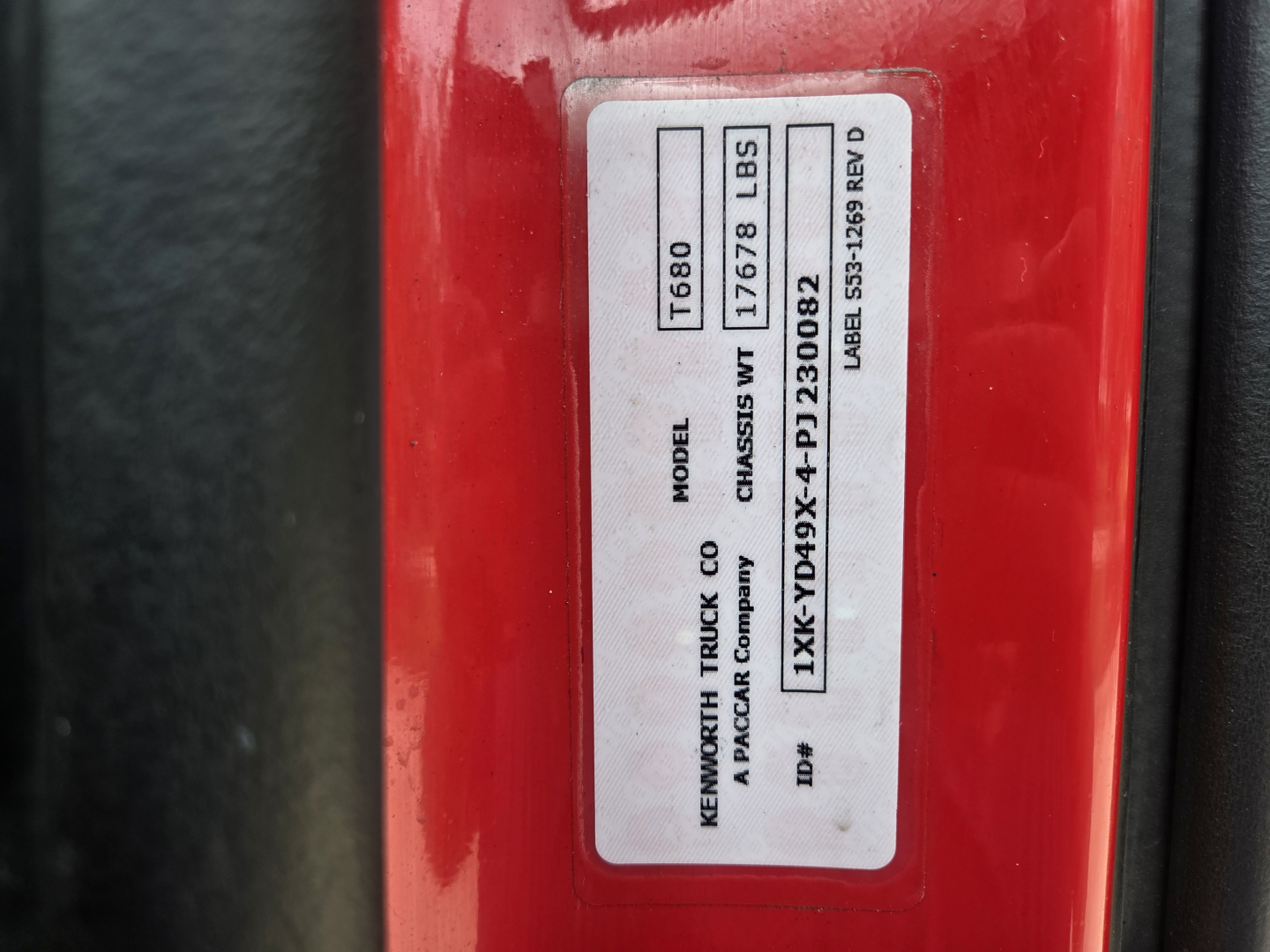 Kenworth T680 identification plate on door jamb showing model T680 and VIN details