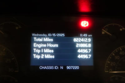 Dashboard display showing total miles 82241.2, engine hours 2186.8, trip miles 4496.7, date Wednesday 10/15/2025, chassis ID N 907220.
