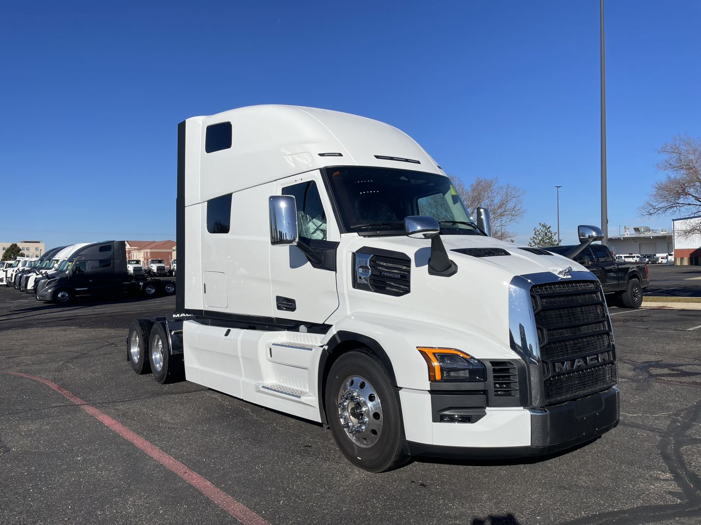 Truck cab: 2026 Mack PR64T76H conventional sleeper tractor, white with black grille, chrome wheels, dual rear axles, side mirrors; VIN 1M1PR4GY8TM101579, stock 71434.
