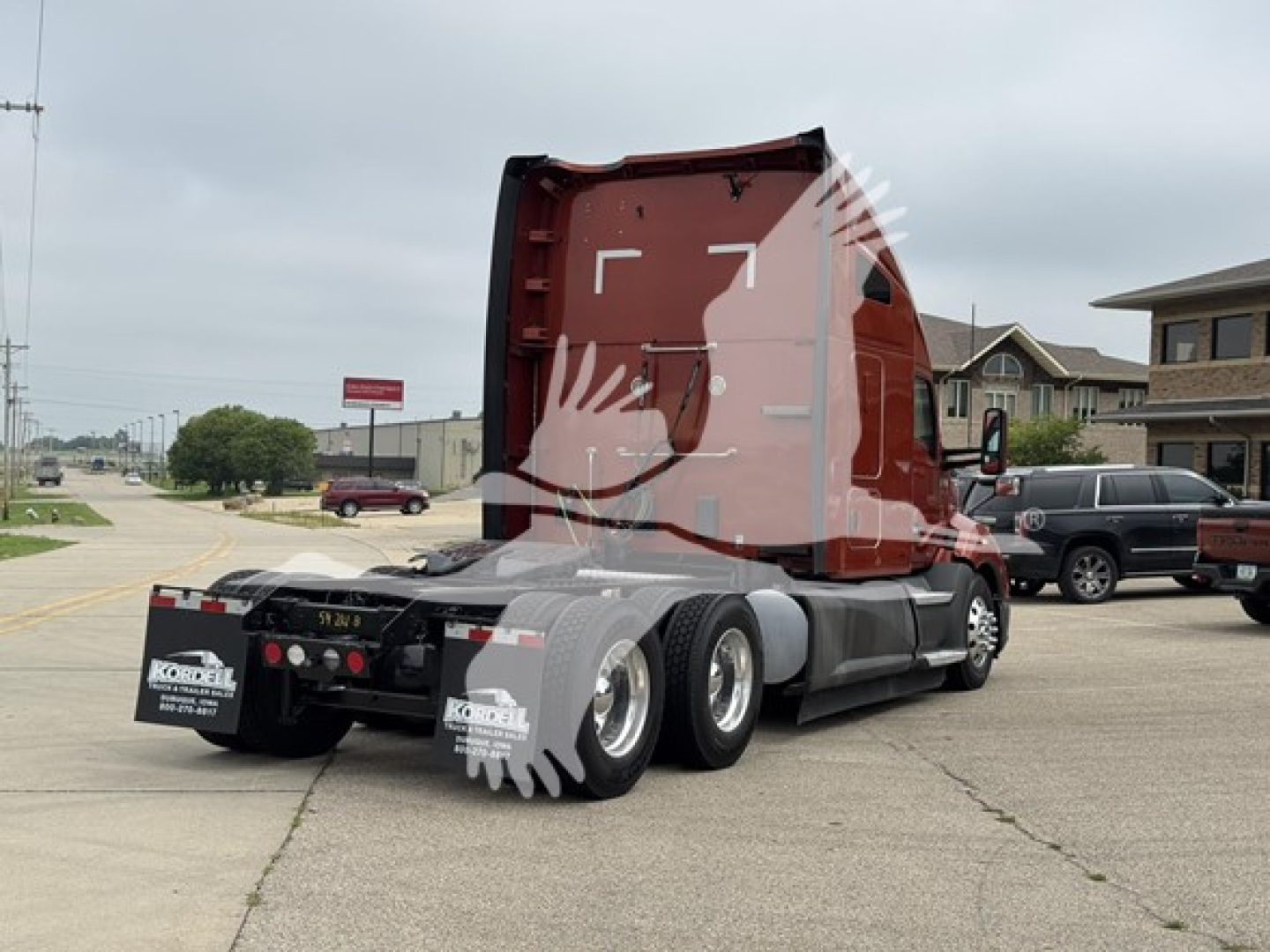 Kenworth T680 tractor in a parking lot, rear and left side visible, red sleeper cab with black chassis and six wheels, stock number 59214-B.