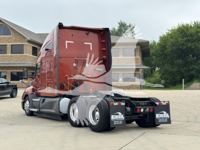 Kenworth T680 tractor rear view showing dual rear axles and red sleeper cab