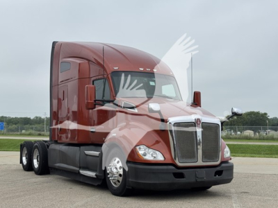 Kenworth T680 truck side view showing large grille and sleeper cab