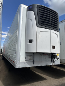 Utility 3000R trailer front view with refrigeration unit and white side panels, stock UE11677, VIN 150120621176 visible.