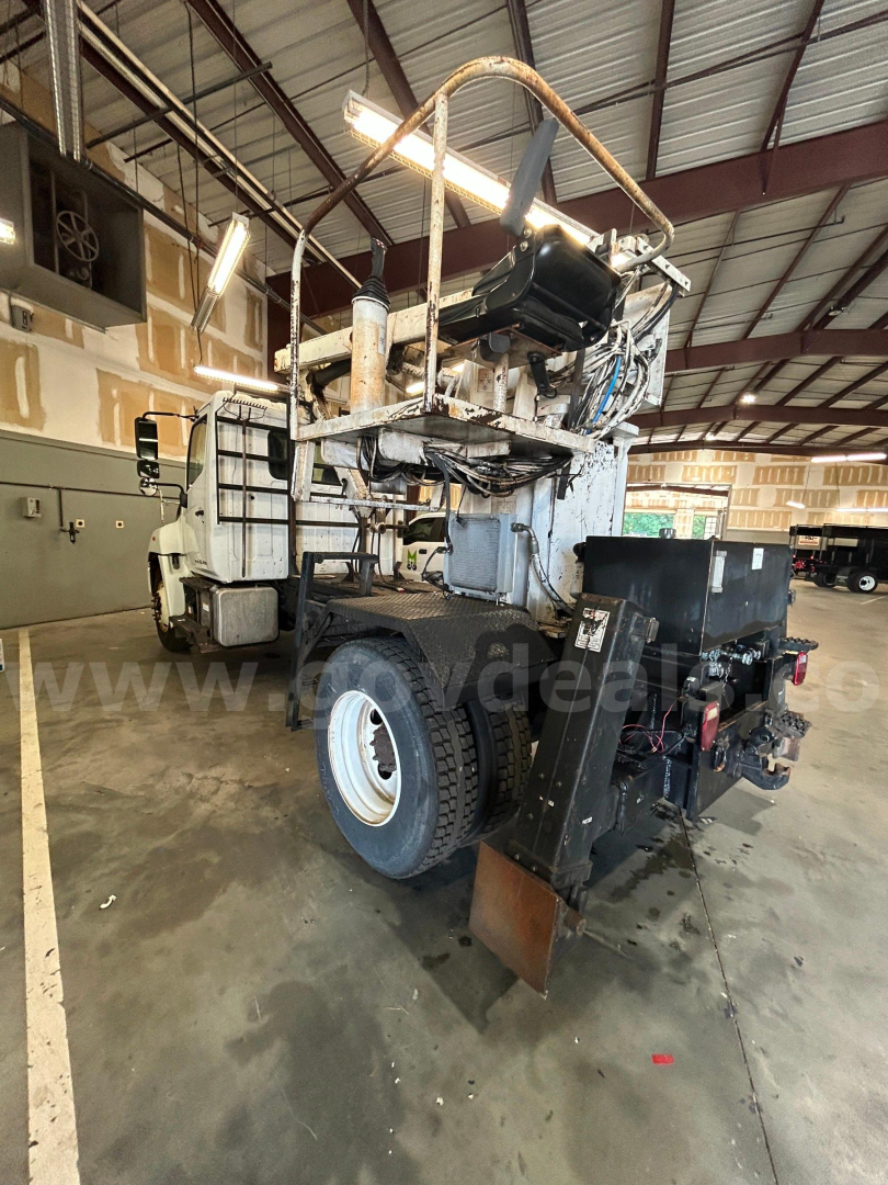 Hino 338 boom truck rear and side view showing hydraulic equipment and platform