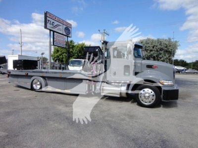 Peterbilt 337 rollback truck side view with long flatbed and gray cab, VIN 2NP2HM6X9NM804653, stock J04653.