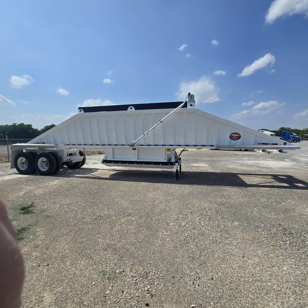 Trailer showing CTs BDT-40 air ride dump trailer profile with dual axle, side rails, and support beams. VIN 5TU... visible on side. 