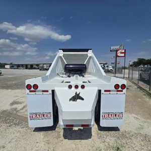 Rear view of a white dump trailer with bulkhead and air ride system, showing rear lights and mudflaps with 'Construction Trailer Specialists' logos.