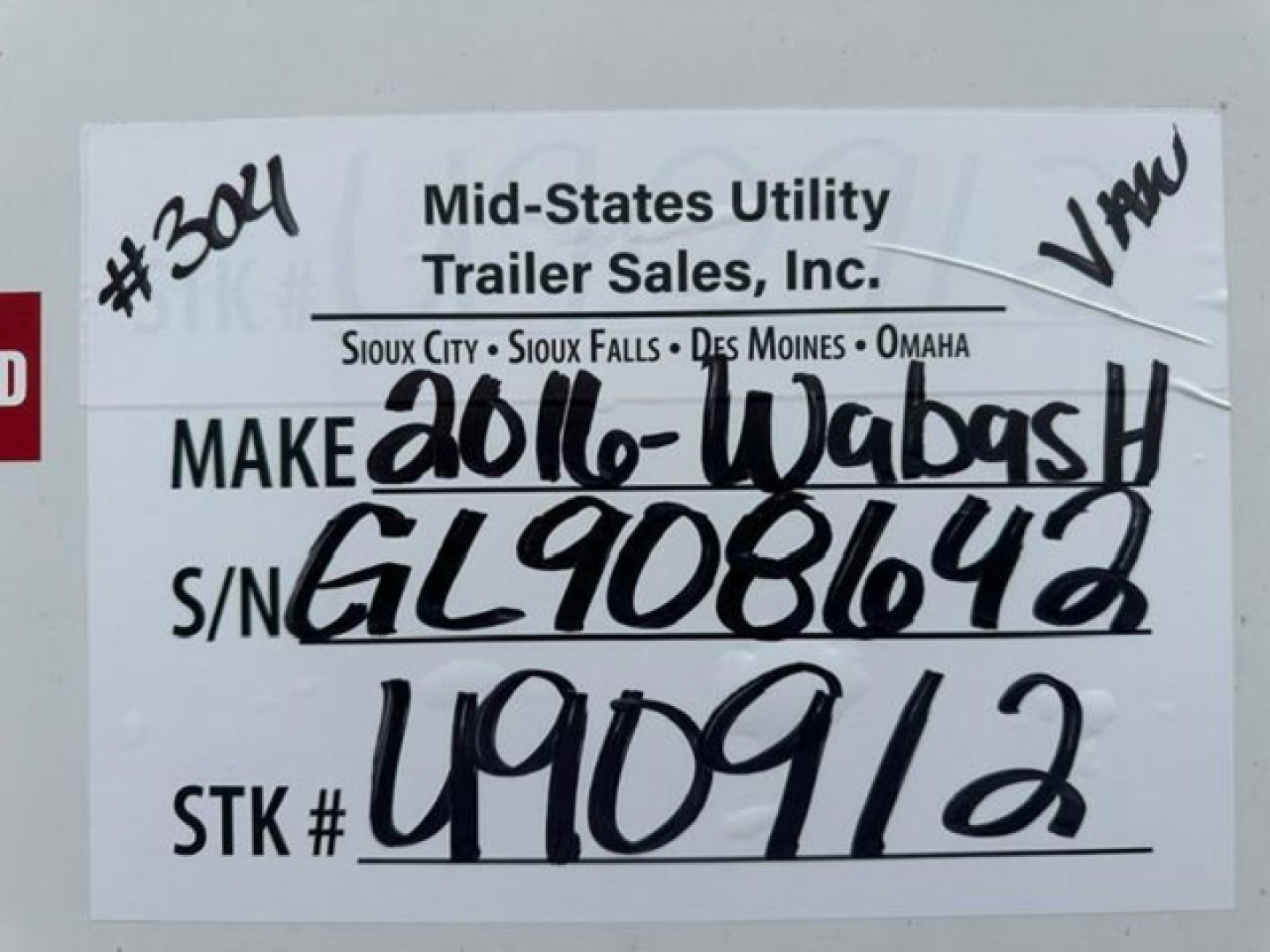 Label on a trailer showing Make 2016-Wabash, VIN 1JJV532D8GL908642, S/N GL9081642, Stock U90912, STK # U90912, Mid-States Utility Trailer Sales handwritten details.