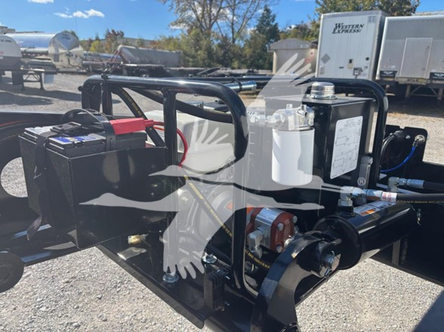 Fontaine N20 lowboy trailer showing pony motor with battery and hydraulic components visible.