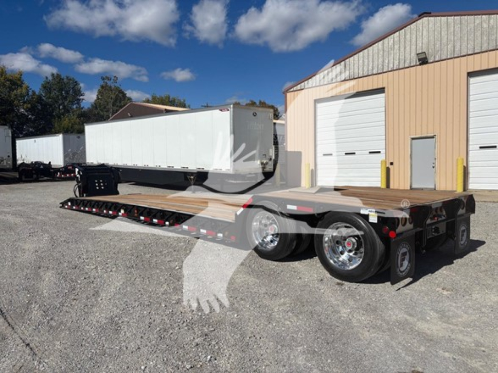 Fontaine N20 lowboy trailer with pony motor, empty flatbed, dual rear axles, white drop deck, on gravel lot