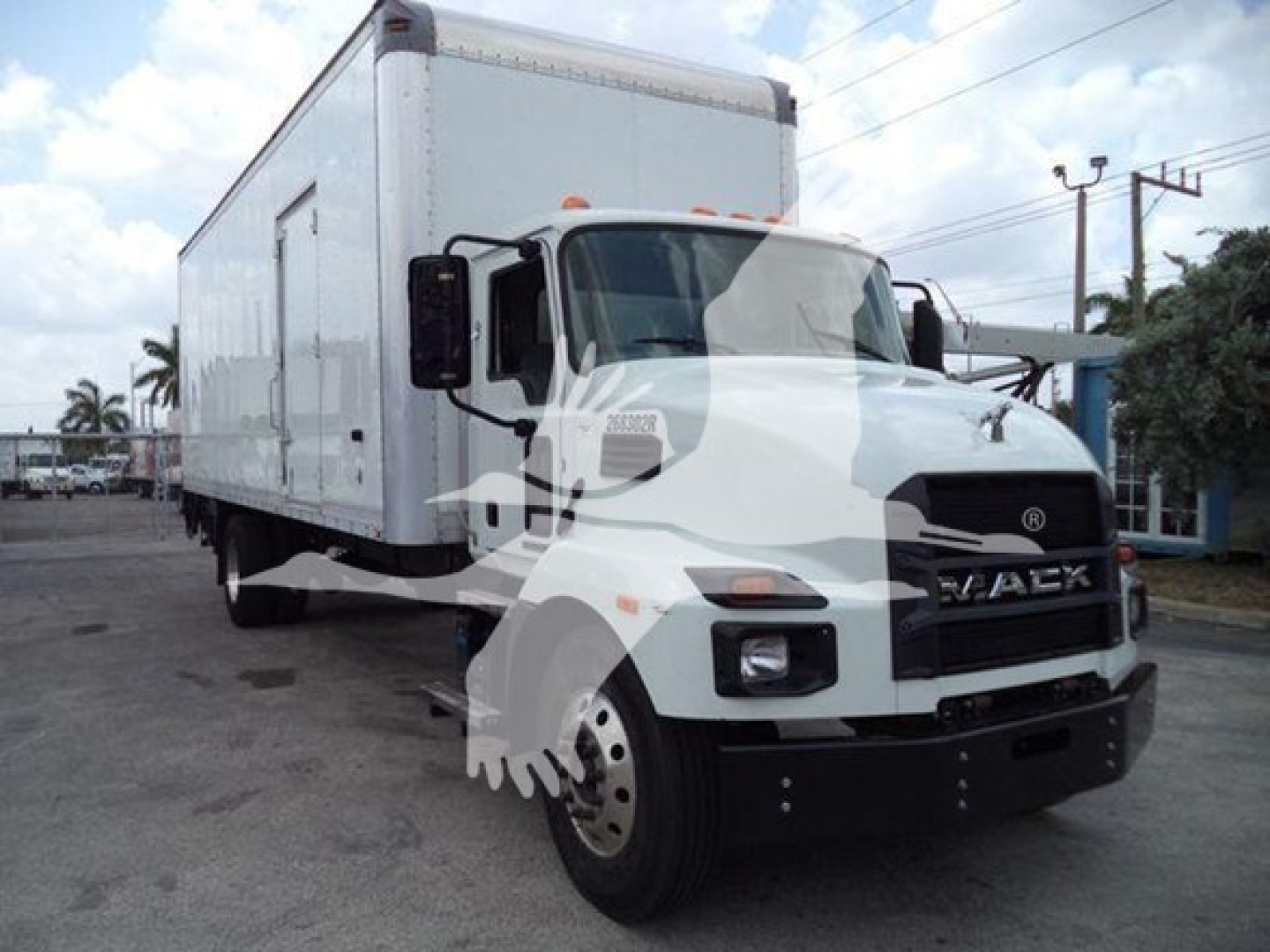 Box truck in view showing front and left side of a 2023 Mack MD7 with white cab and box body, VIN 1M2MDBAB3PS071396, stock 268302R, used.