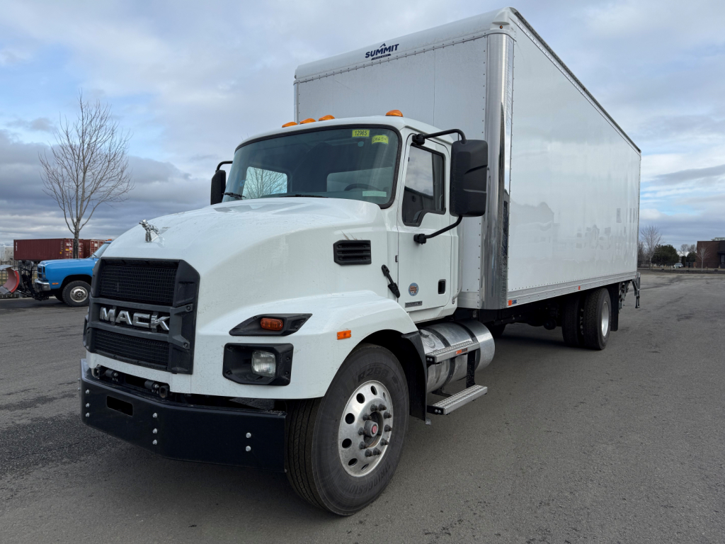 Mack MD6 box truck in white viewed from front-left showing cab and box trailer.
