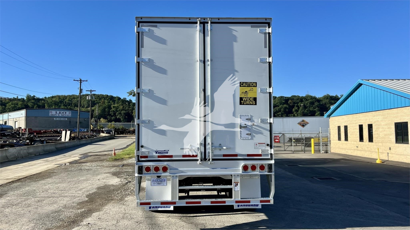 rear view of a Vanguard globe reefer trailer showing doors and warning labels
