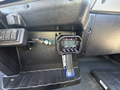 MD7 dash area showing digital control panel and wiring harness near steering column.