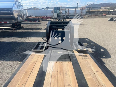  Fontaine 55 PVR Pro lowboy trailer gooseneck hitch in foreground with wooden deck sections and hydraulic components.