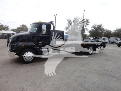 Truck cab and flatbed rollback w/ reflection on watermarked image