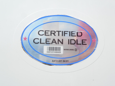 Oval sticker reading CERTIFIED CLEAN IDLE with barcode and small Detroit Diesel text on a white surface.