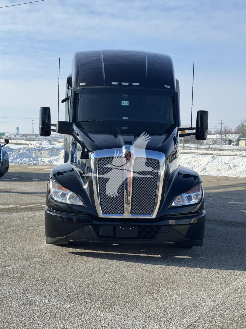 Kenworth T680 truck front view showing prominent grille and headlights.