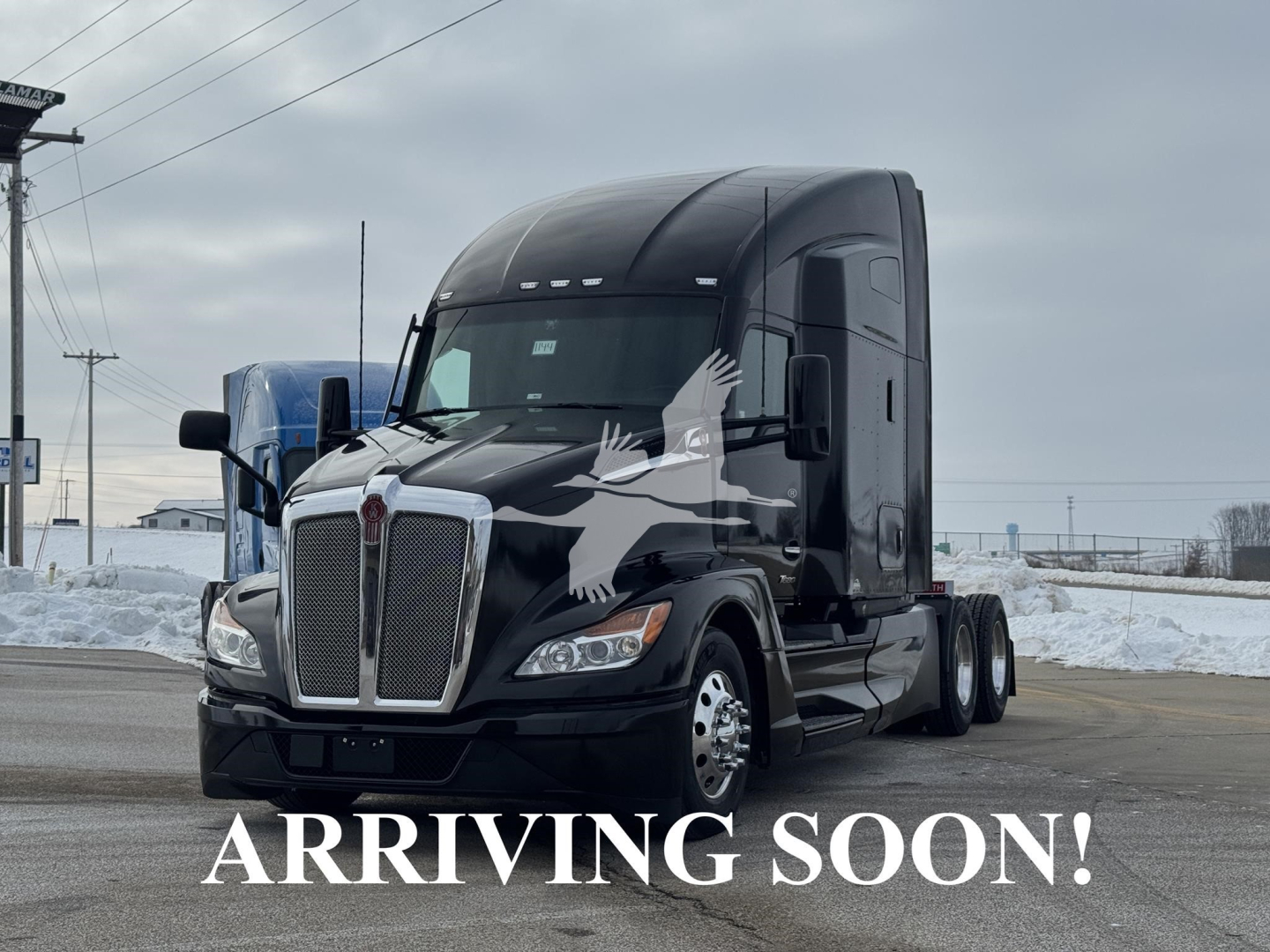 Kenworth T680 tractor-trailer in black, front-left view, with ‘ARRIVING SOON!’ text overlay on image.