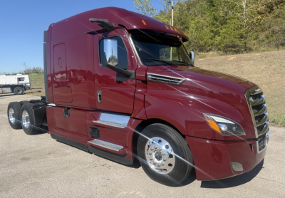 Freightliner Cascadia 126 sleeper cab truck in maroon color, side view showing chrome wheels and Dual rear axles, front grille and headlight details.