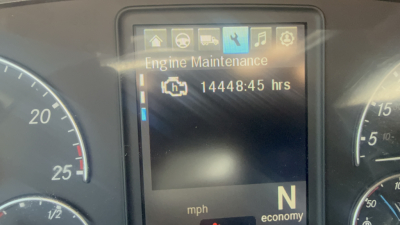Dashboard screen showing Engine Maintenance with 14448:45 hrs and icons on top. Partial gauges visible on left and right.