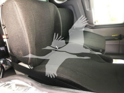 Peterbilt 337 cab interior showing front seat and seat belt receding into image with logo watermark.