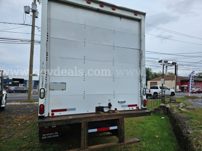 Rear view of a white box truck tailgate with bumper and hitch, Sterling Acterra branding not visible, stock information in listing text