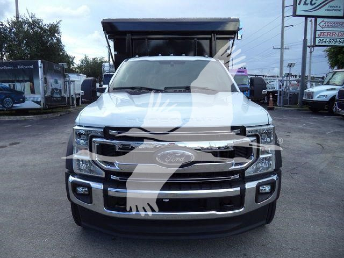 Ford F-550 front view in service body with grille and bumper, stock image for 2022 Ford F550 roll-off truck.