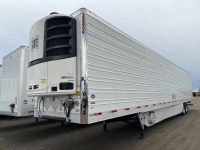 Utility 3000R trailer with Thermo King reefer unit showing side panels and landing gear.