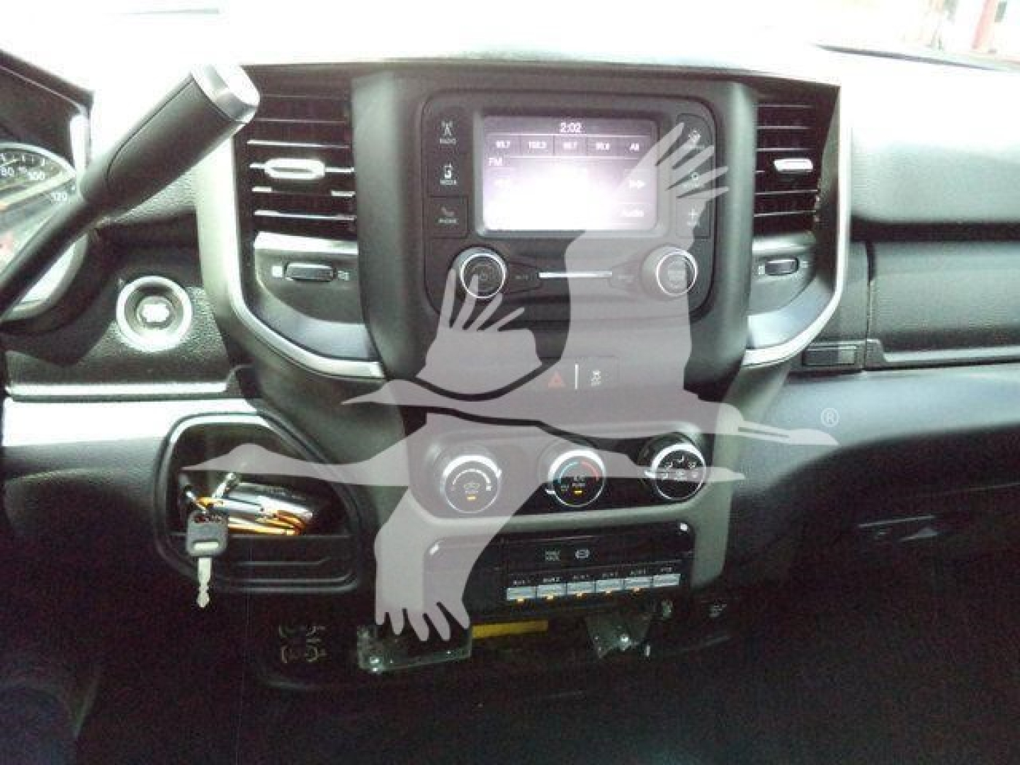 Ram 5500 dashboard with center touchscreen and control knobs inside cab