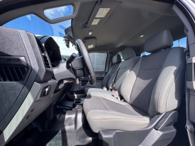 Ford F-150 2018 interior front seats driver area showing dashboard and steering wheel