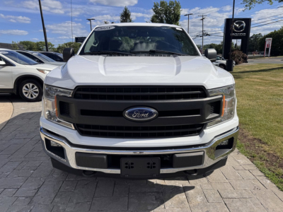 2018 Ford F-150 front view showing Ford emblem grille and bumper.