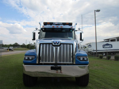 Front view of a blue 2026 Western Star 49X dump truck with chrome grille and bumper.